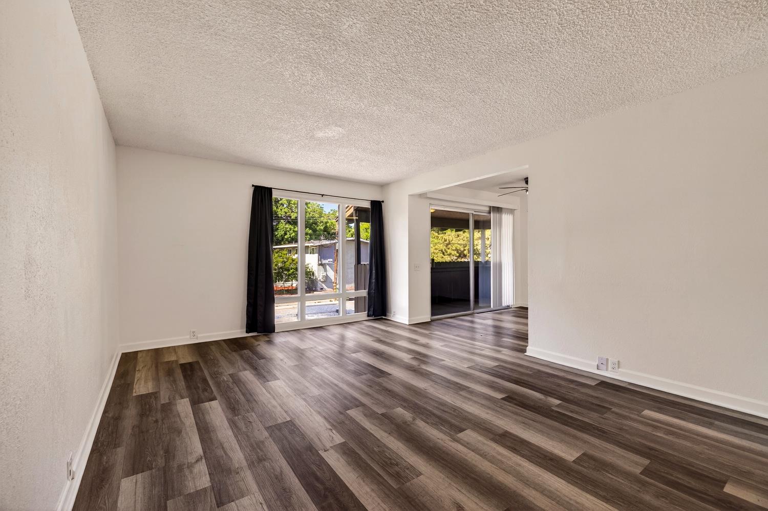 615 Rancheria Drive Chico, CA 95926 - Photo 29 of 80 wooden floor in an empty room with a window