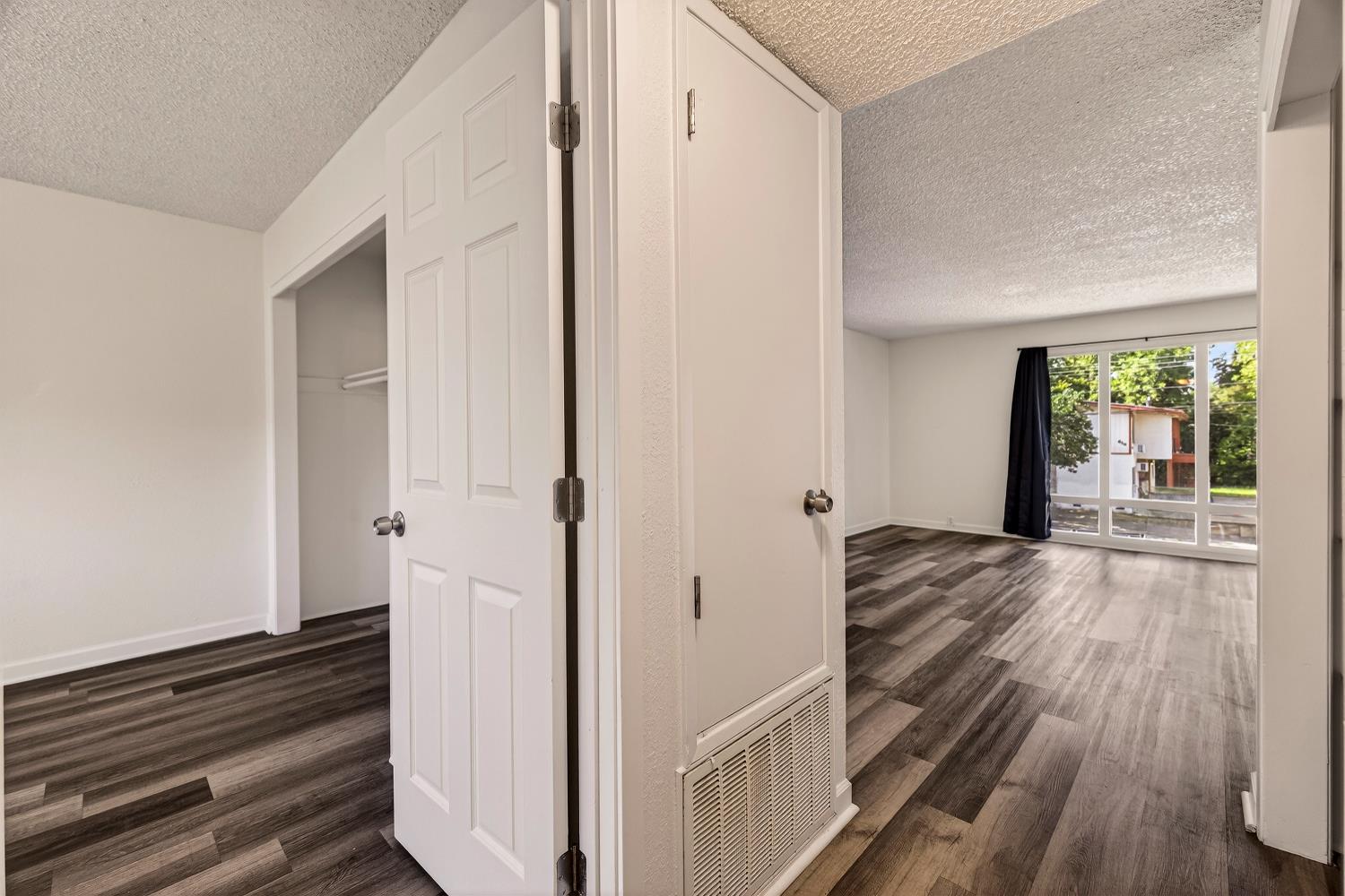 615 Rancheria Drive Chico, CA 95926 - Photo 41 of 80 a view of a hallway with wooden floor and staircase