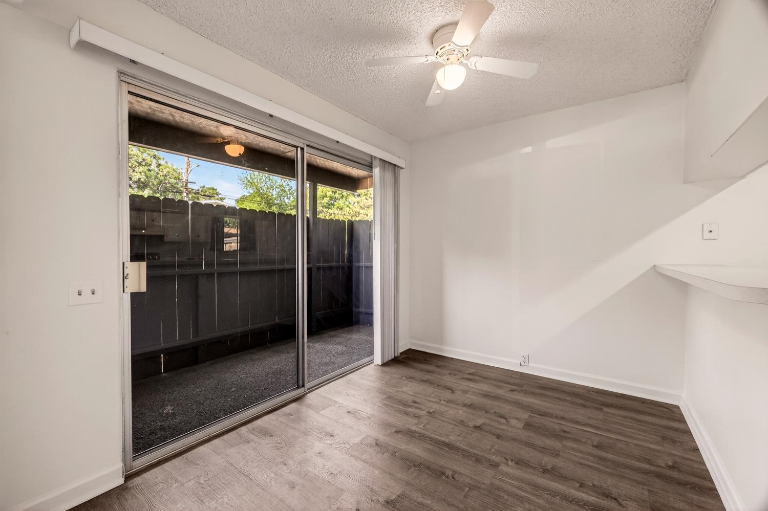 615 Rancheria Drive Chico, CA 95926 - Photo 51 of 80 a view of empty room with wooden floor and fan