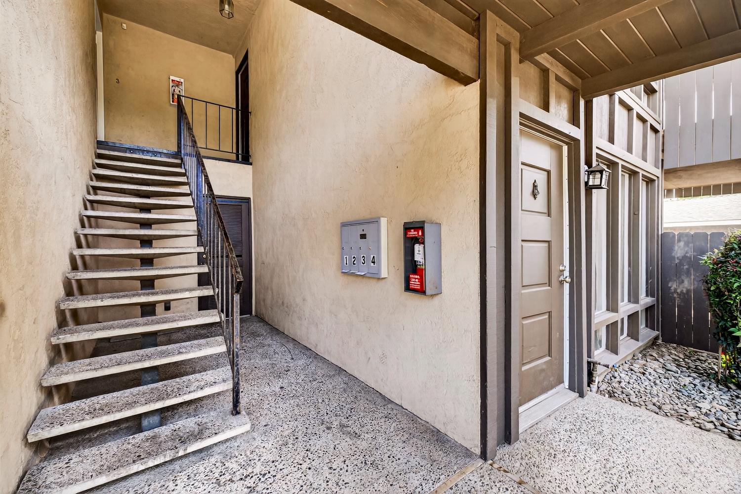 615 Rancheria Drive Chico, CA 95926 - Photo 8 of 80 a view of entryway with stairs and wooden floor