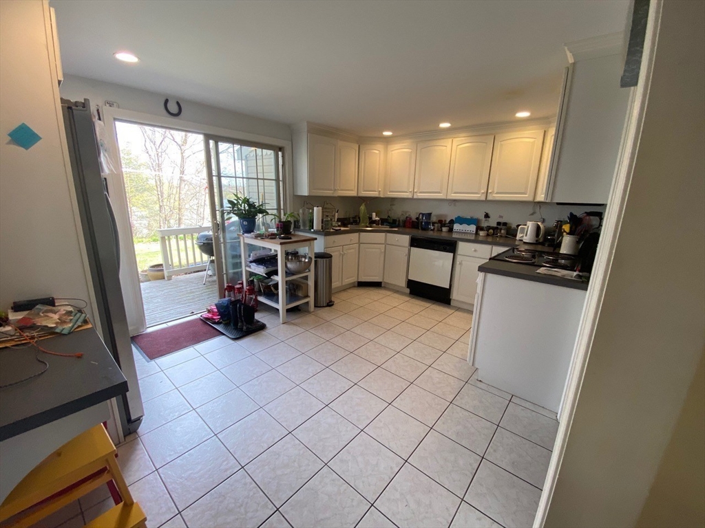 14 Park Place, Unit 14 Arlington, MA 02474 - Photo 7 of 20 a kitchen with sink cabinets and appliances