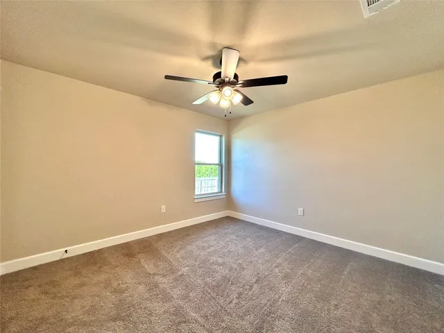 a view of a kitchen cabinets and wooden floor