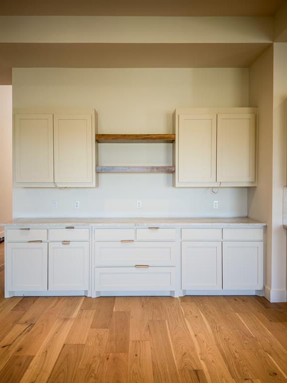 208 Pecan Street Roanoke, TX 76262 - Photo 21 of 38 a view of a kitchen with white cabinets