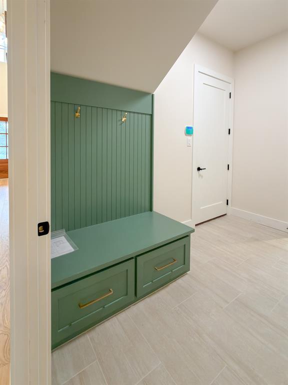 208 Pecan Street Roanoke, TX 76262 - Photo 23 of 38 a room with a closet and mirror