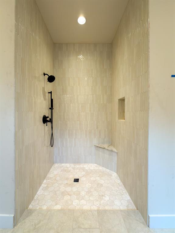 208 Pecan Street Roanoke, TX 76262 - Photo 28 of 38 a bathroom with a bathtub