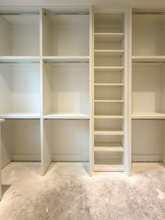 208 Pecan Street Roanoke, TX 76262 - Photo 29 of 38 a view of walk in closet with empty racks