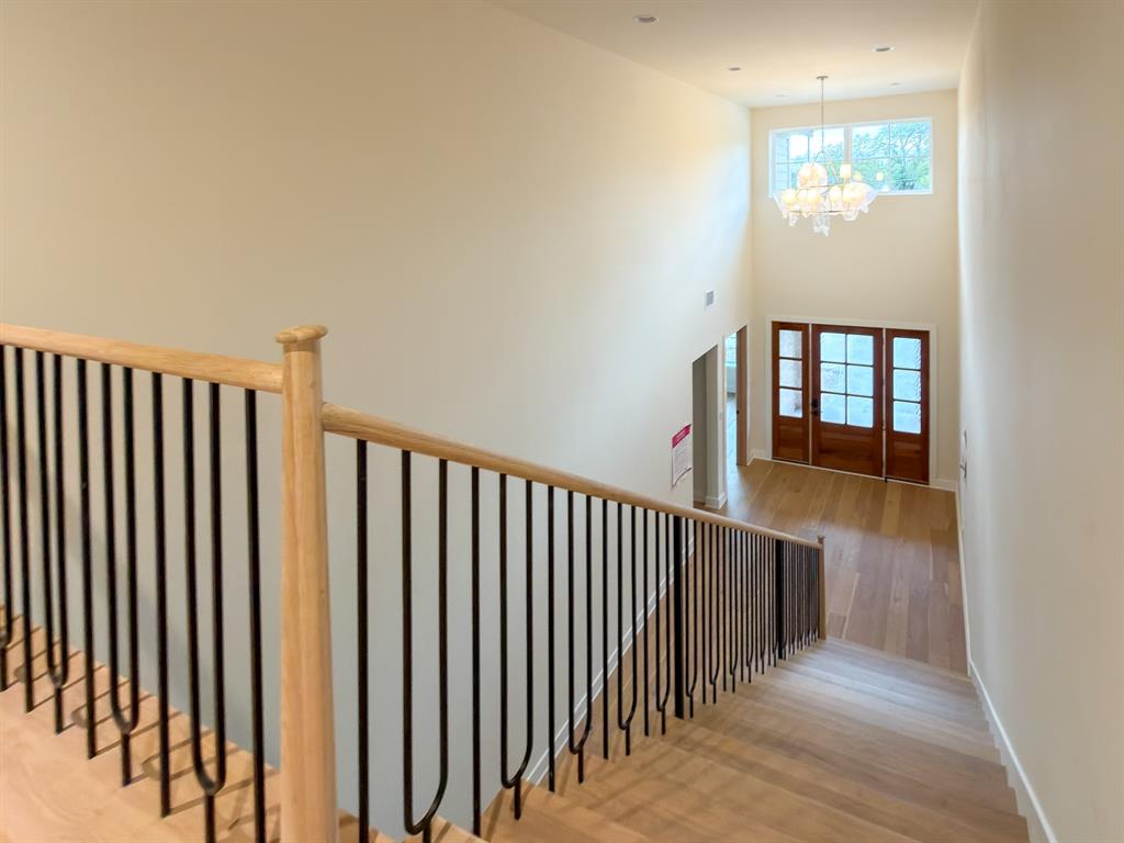 208 Pecan Street Roanoke, TX 76262 - Photo 30 of 38 a view of a hallway with windows