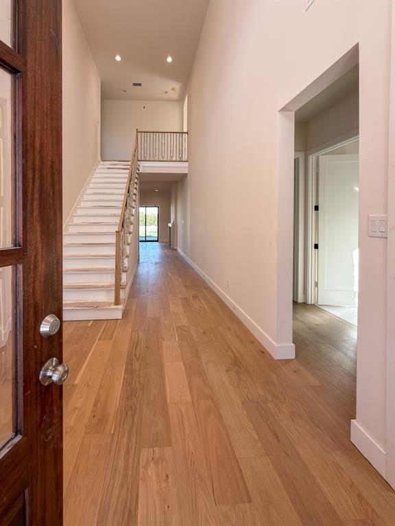 208 Pecan Street Roanoke, TX 76262 - Photo 5 of 38 a view of entryway and hall with wooden floor