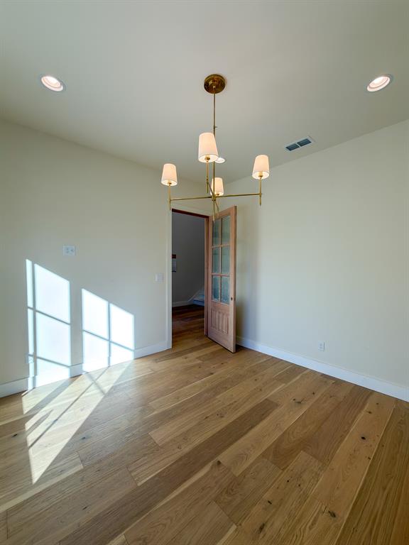208 Pecan Street Roanoke, TX 76262 - Photo 7 of 38 a view of a livingroom with a chandelier