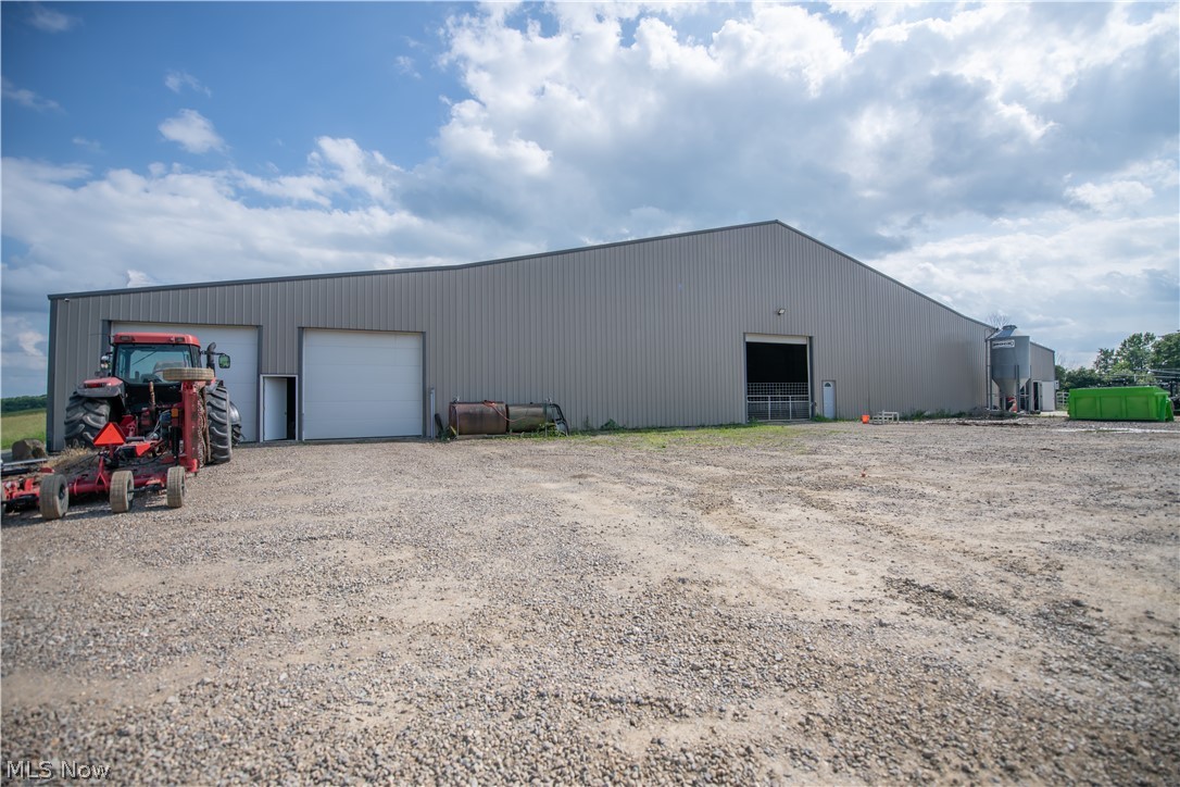 9918 Ridge Road Southeast Uhrichsville, OH 44683 - Photo 34 of 42 View of Garages and Entrance to Arena