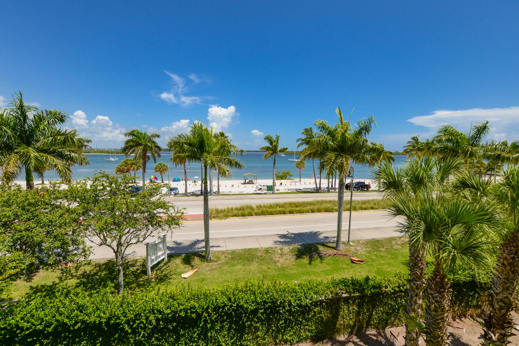 35 Harbour Isle Drive West, Unit 302 Fort Pierce, FL 34949 - Photo 2 of 30 a view of a swimming pool with a patio