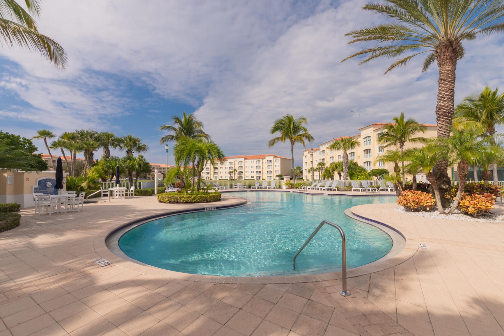35 Harbour Isle Drive West, Unit 302 Fort Pierce, FL 34949 - Photo 26 of 30 a view of a swimming pool