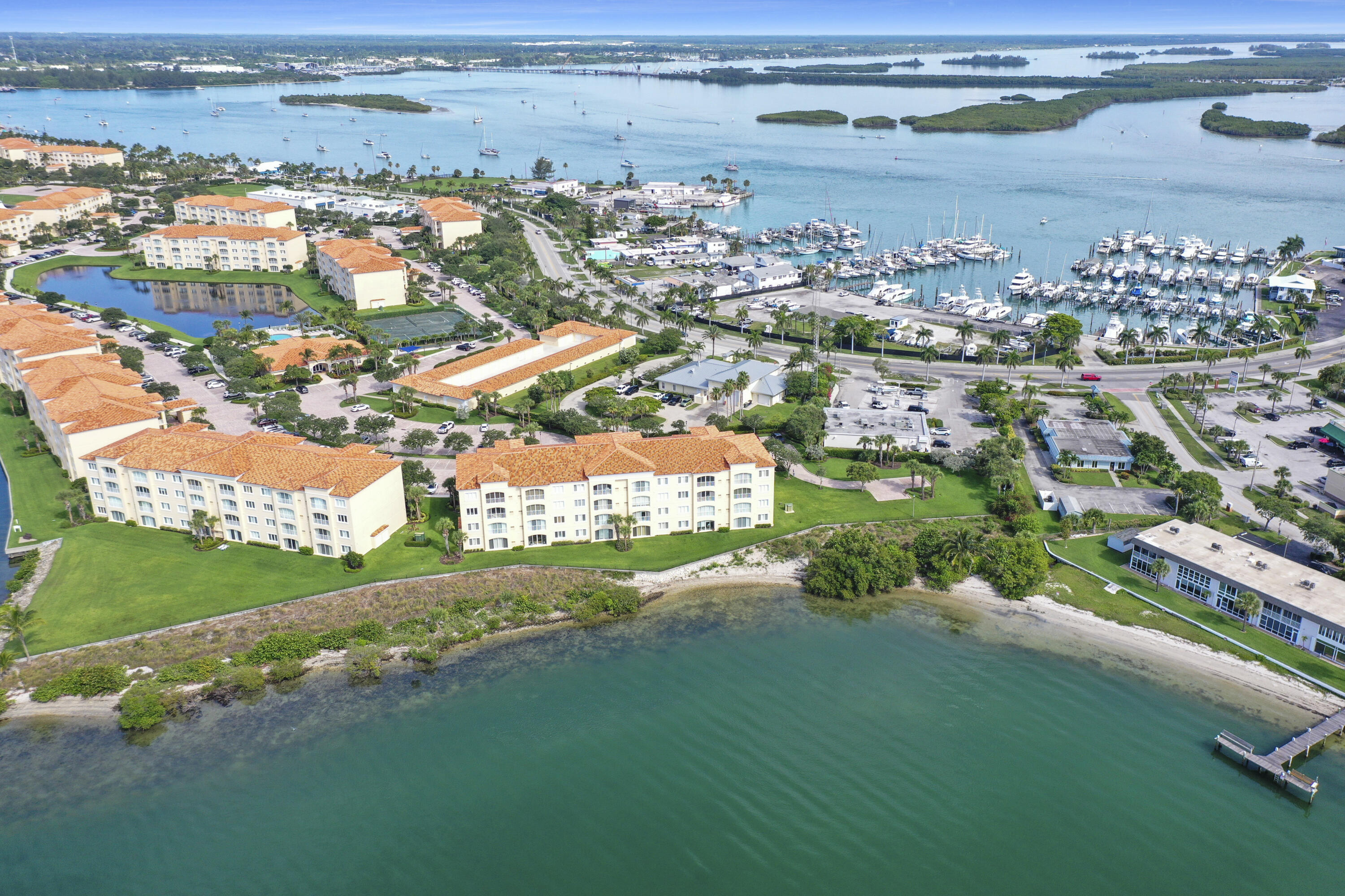 35 Harbour Isle Drive West, Unit 302 Fort Pierce, FL 34949 - Photo 29 of 30 an aerial view of multiple house