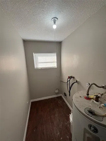 a room with a sink and a window