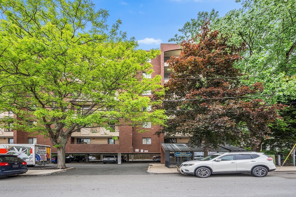39 Parlin Street, Unit 503 Everett, MA 02149 - Photo 22 of 24 a car parked in front of a house