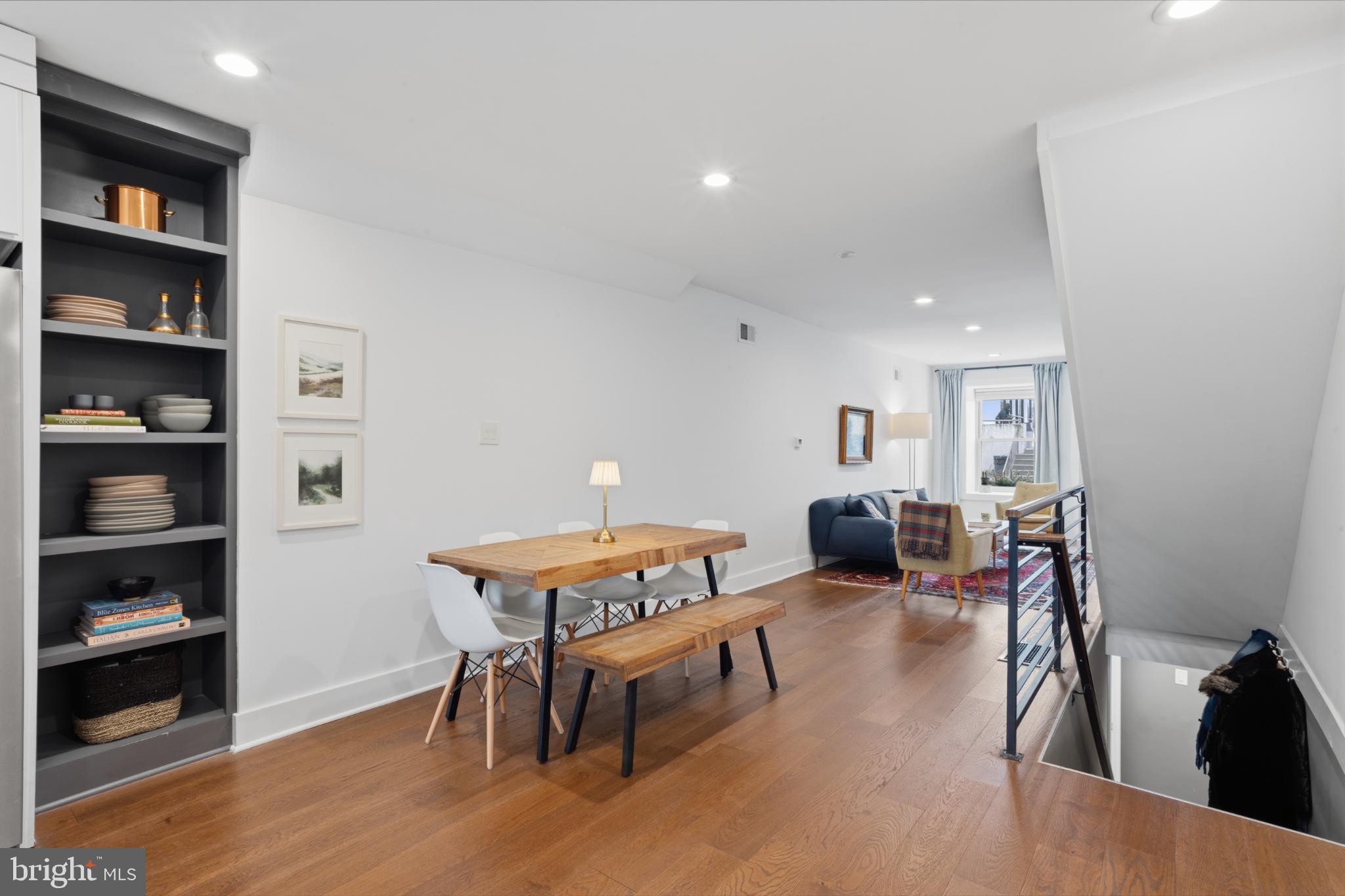 173 West Price Street Philadelphia, PA 19144 - Photo 11 of 40 a bedroom with furniture and a wooden floor