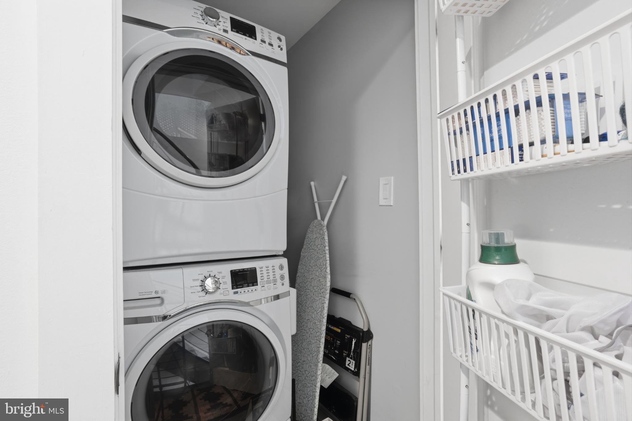 173 West Price Street Philadelphia, PA 19144 - Photo 21 of 40 a view of a hallway with washer and dryer