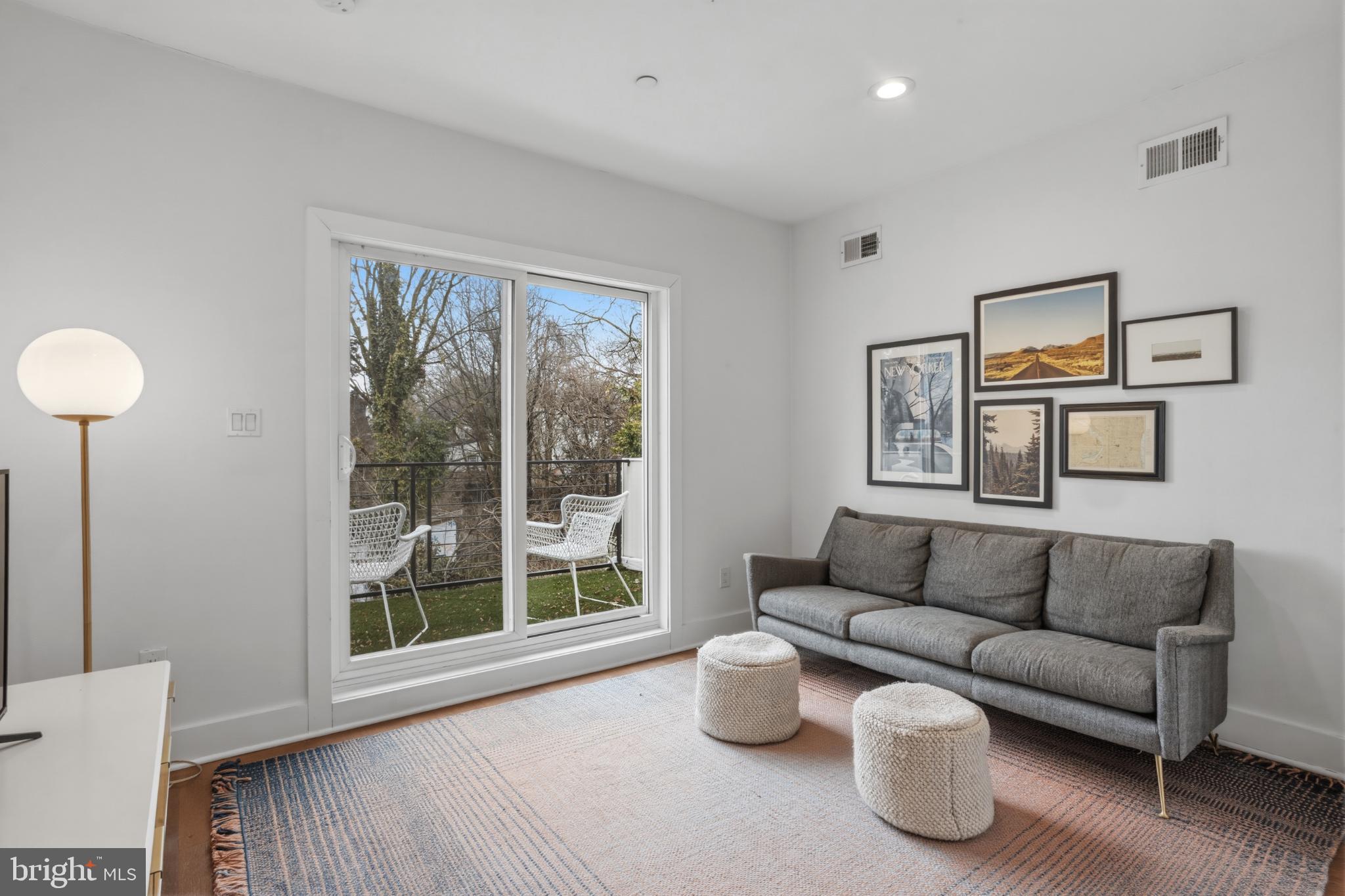 173 West Price Street Philadelphia, PA 19144 - Photo 24 of 40 a living room with furniture and a window