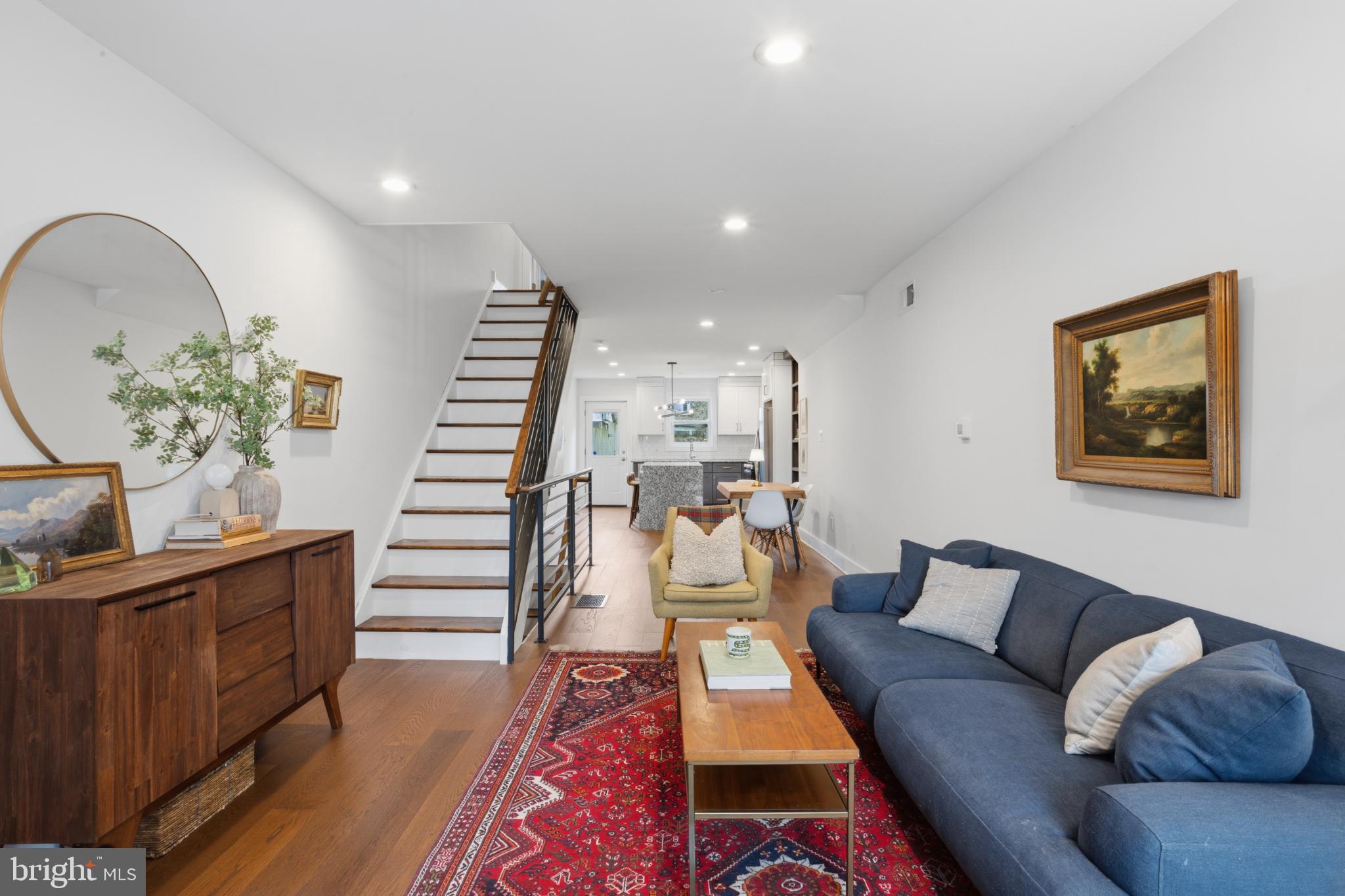 173 West Price Street Philadelphia, PA 19144 - Photo 7 of 40 a living room with furniture and wooden floor