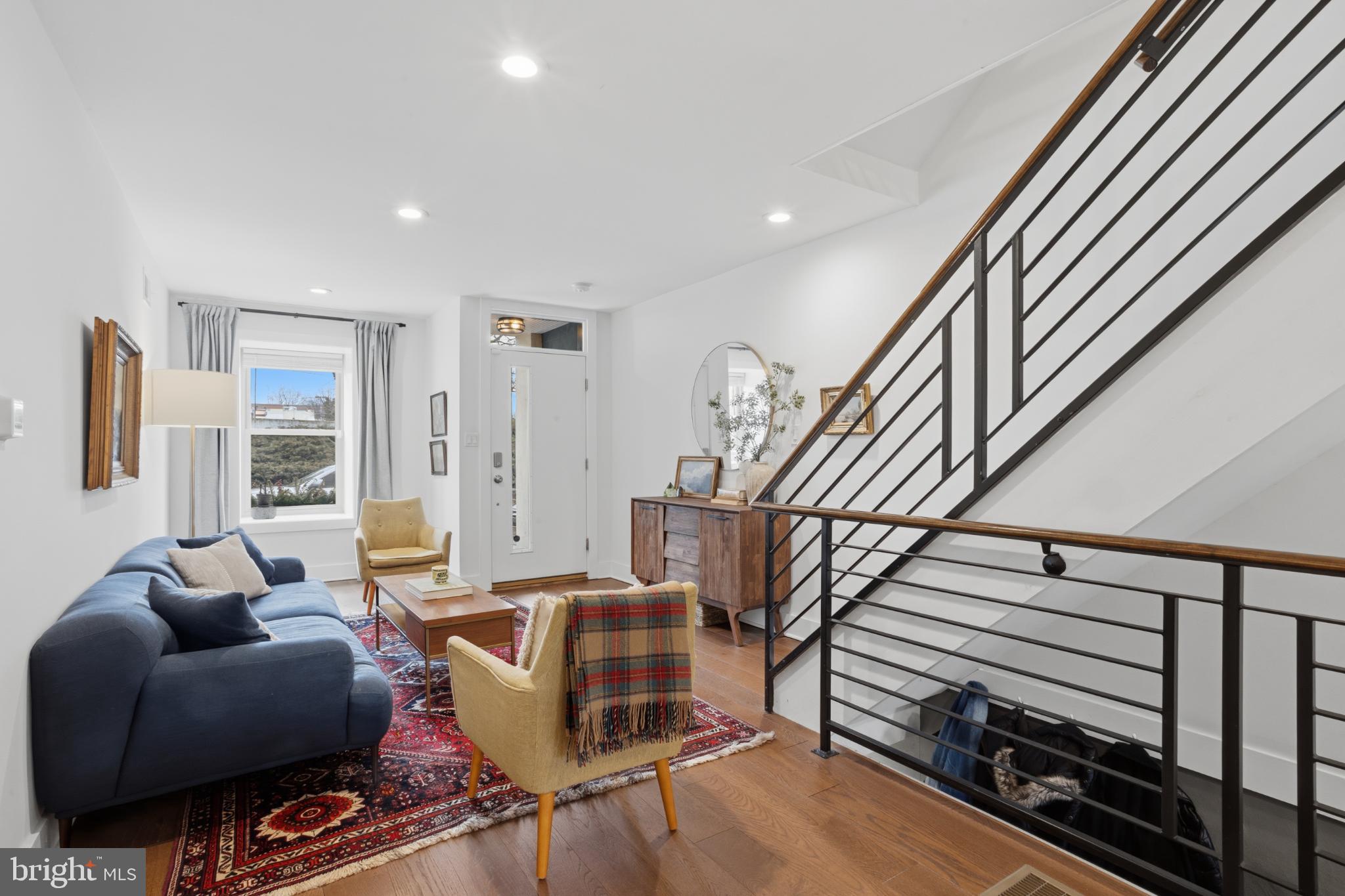 173 West Price Street Philadelphia, PA 19144 - Photo 9 of 40 a living room with furniture and wooden floor