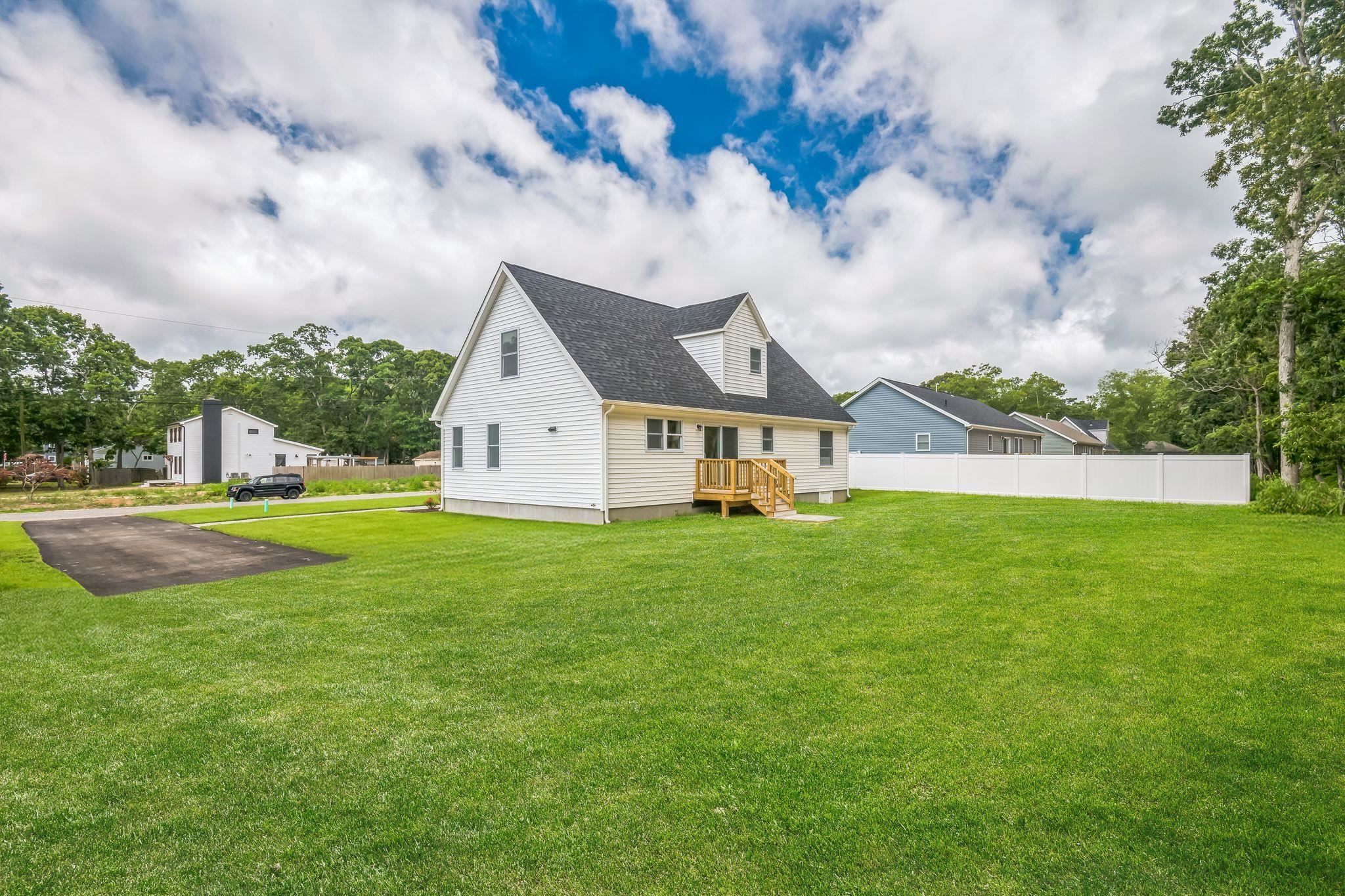 70 West Rising Sun Drive Ocean View, NJ 08230 - Photo 12 of 34 a view of a house with a yard