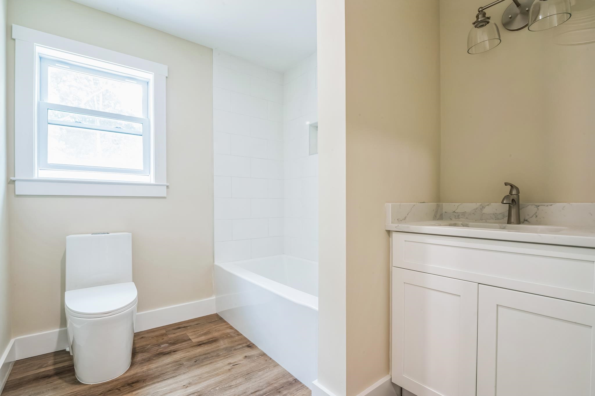 70 West Rising Sun Drive Ocean View, NJ 08230 - Photo 2 of 34 a bathroom with a toilet sink and a bathtub