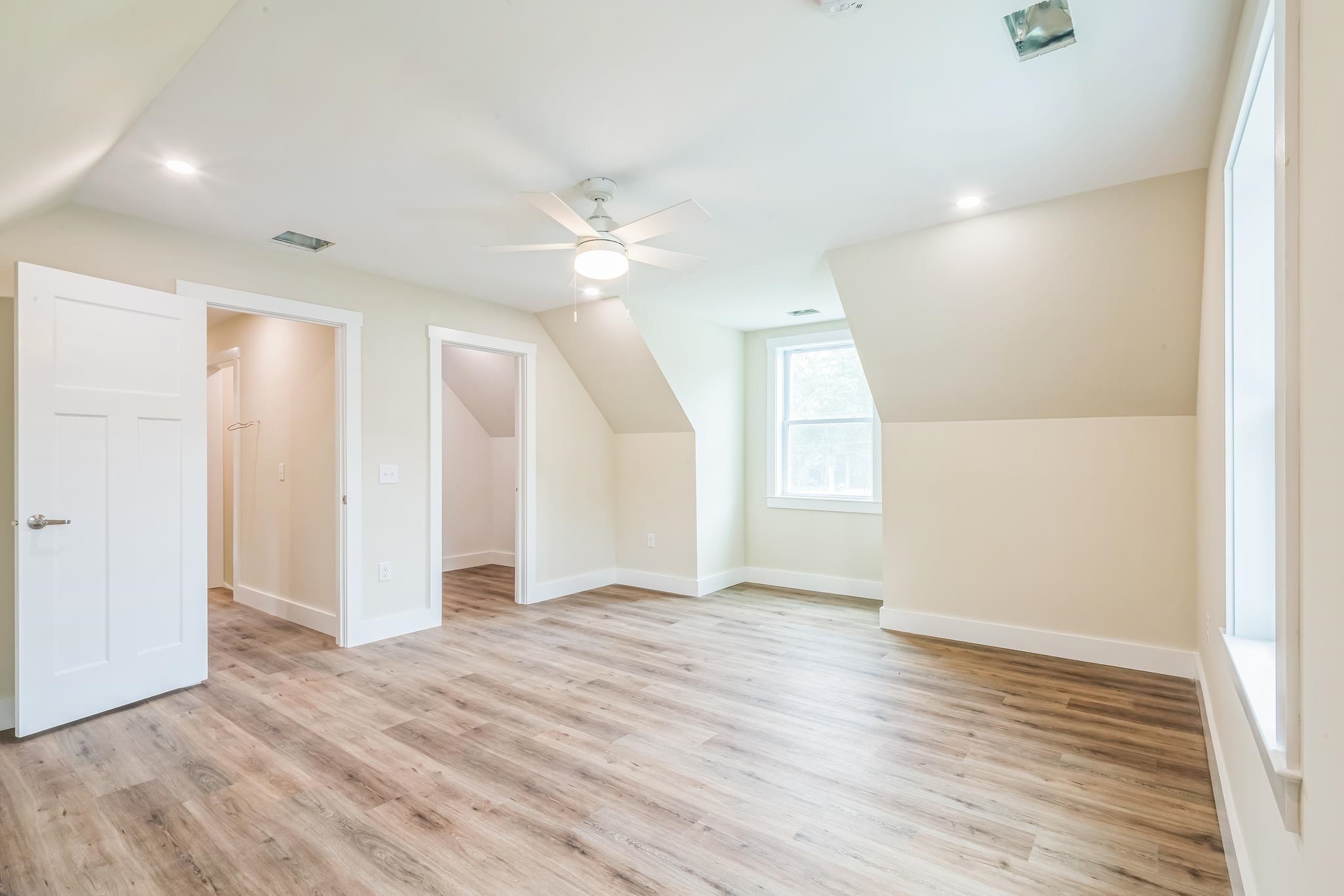 70 West Rising Sun Drive Ocean View, NJ 08230 - Photo 3 of 34 an empty room with wooden floor and ceiling fan