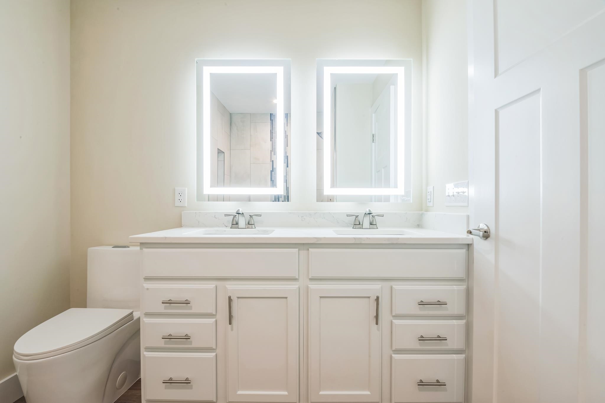 70 West Rising Sun Drive Ocean View, NJ 08230 - Photo 5 of 34 a bathroom with a toilet sink and mirror