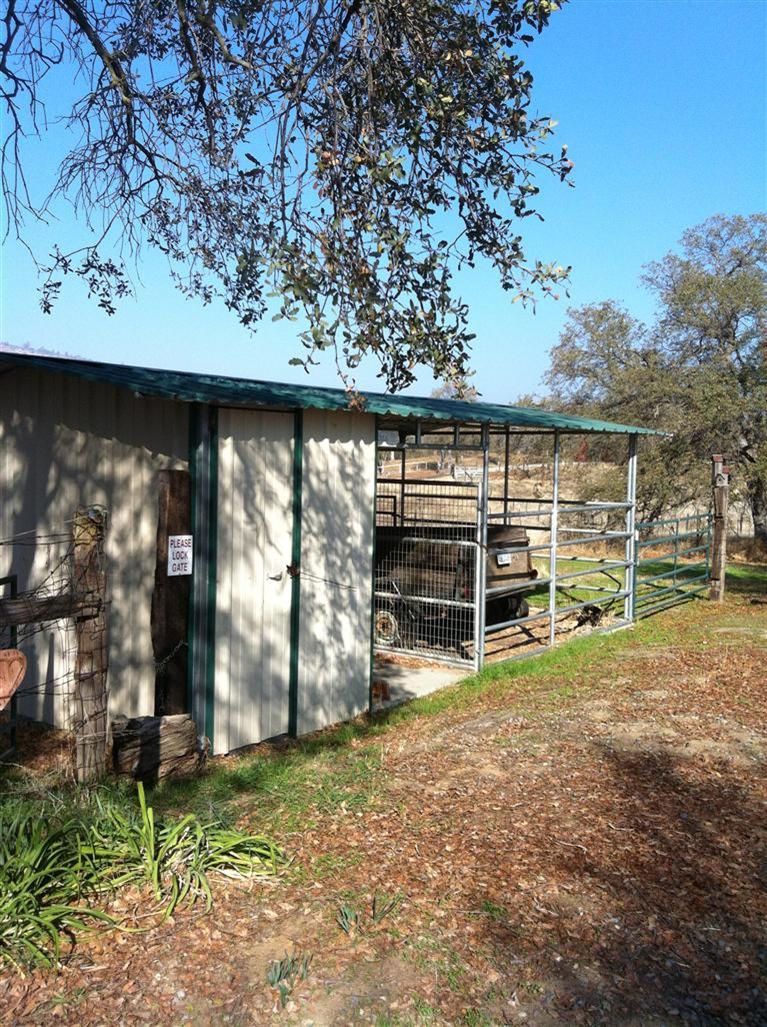 14814 Oak Creek Road Prather, CA 93651 - Photo 4 of 5 Nice Livestock Shelter with Tack Room, property fenced and cross fenced for Animals.
