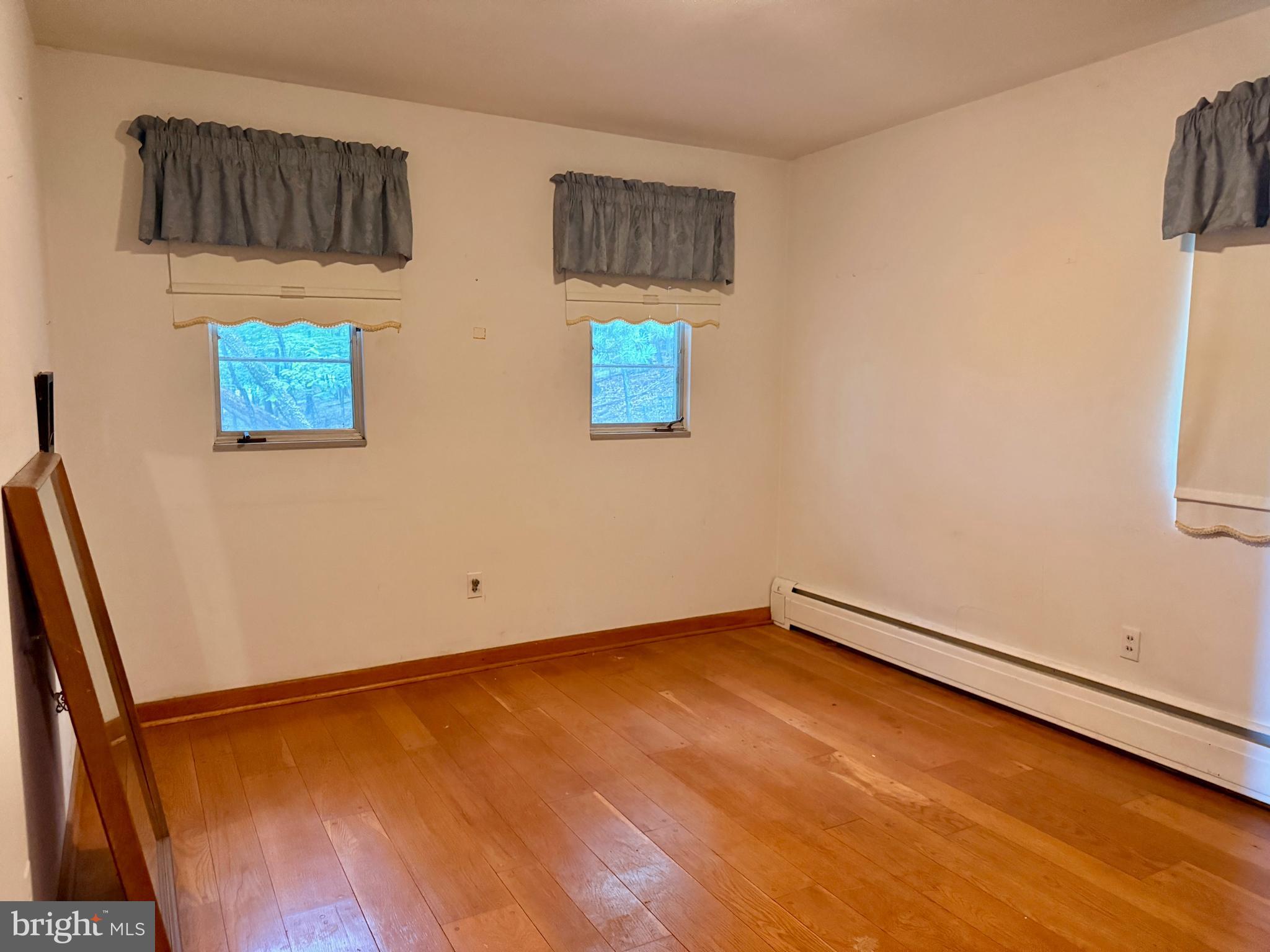 1027 Braddock Road Cumberland, MD 21502 - Photo 20 of 29 a view of an empty room with a window