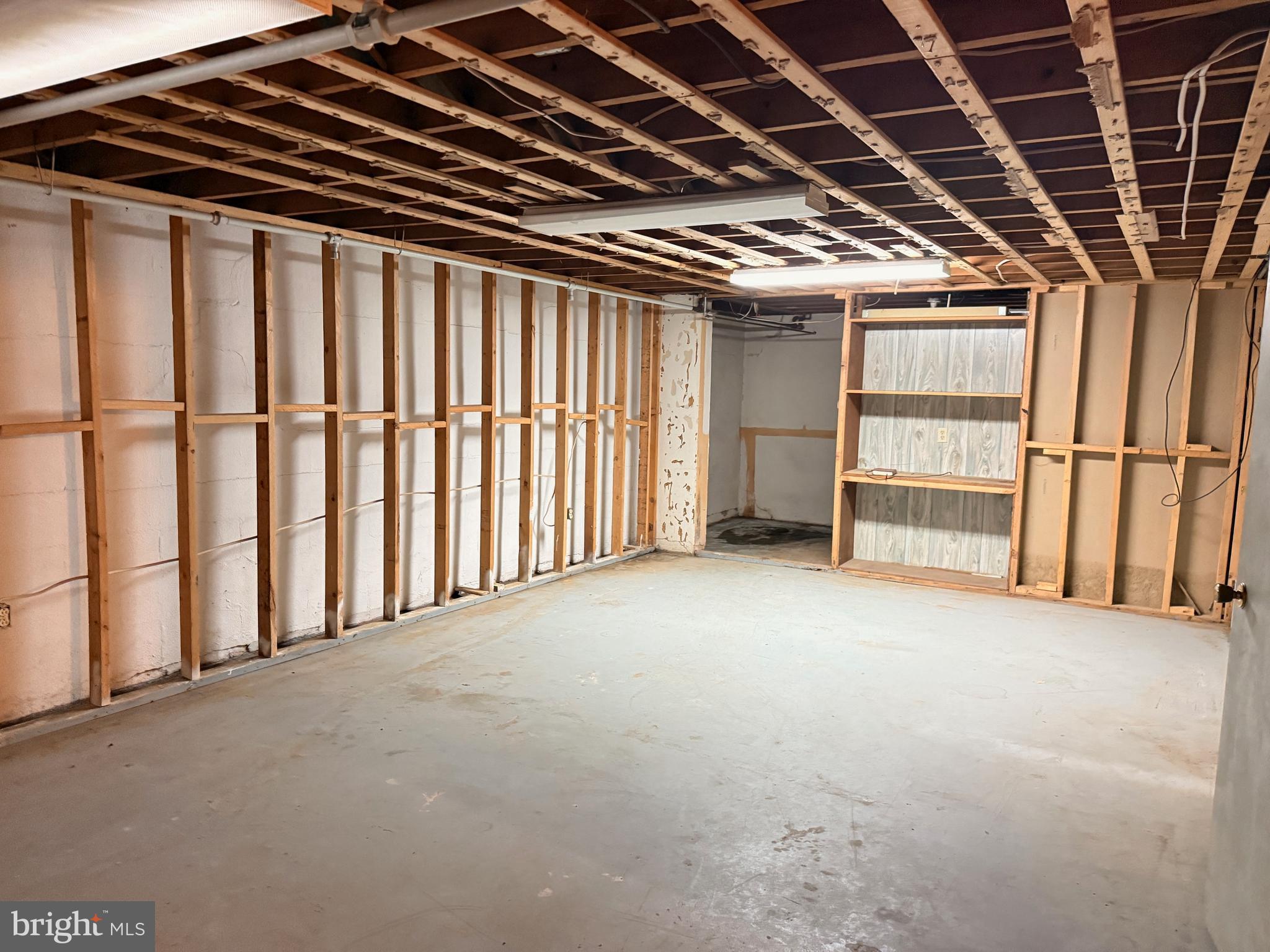 1027 Braddock Road Cumberland, MD 21502 - Photo 22 of 29 a view of an empty room with a fireplace