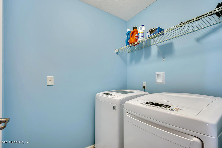 122 Nelson Lane St. Johns, FL 32259 - Photo 13 of 33 a utility room with dryer and washer