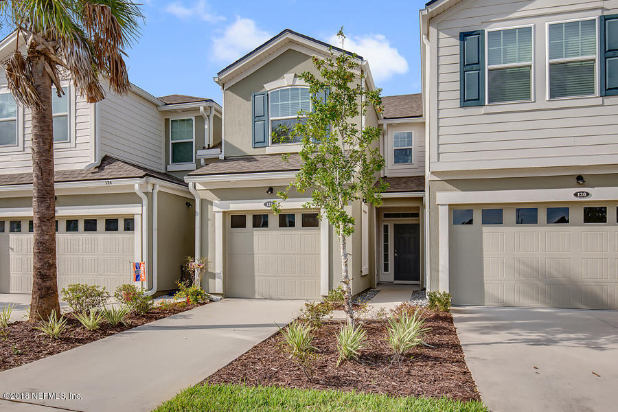 122 Nelson Lane St. Johns, FL 32259 - Photo 2 of 33 a front view of a house with a yard