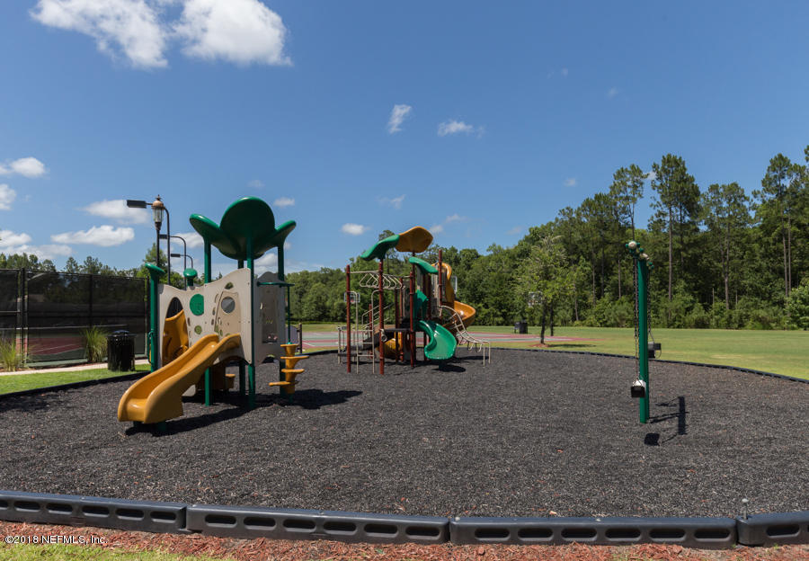 122 Nelson Lane St. Johns, FL 32259 - Photo 26 of 33 a view of a park with swings