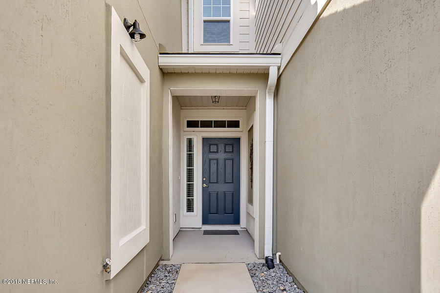 122 Nelson Lane St. Johns, FL 32259 - Photo 3 of 33 a view of a entryway door of the house