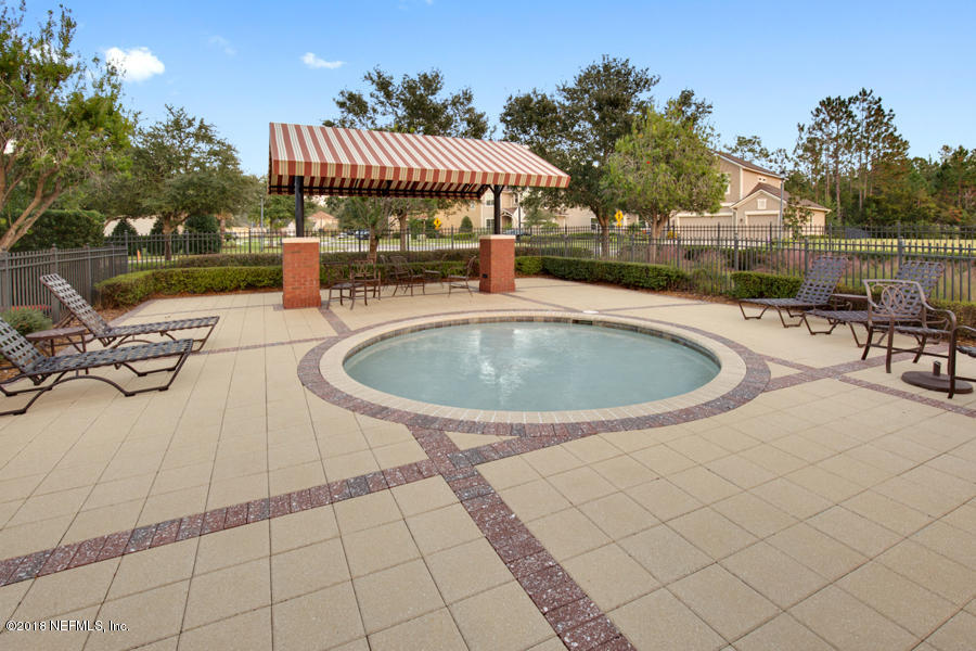 122 Nelson Lane St. Johns, FL 32259 - Photo 32 of 33 a view of a swimming pool with a patio