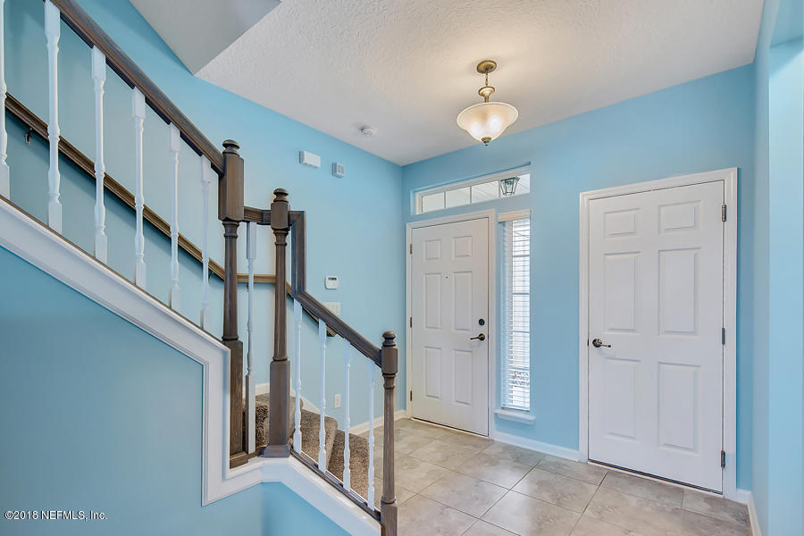122 Nelson Lane St. Johns, FL 32259 - Photo 4 of 33 a view of an entryway with staircase