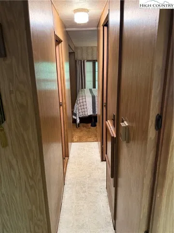 a view of hallway with shower