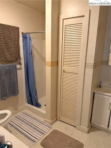 a view of a bathroom from a door