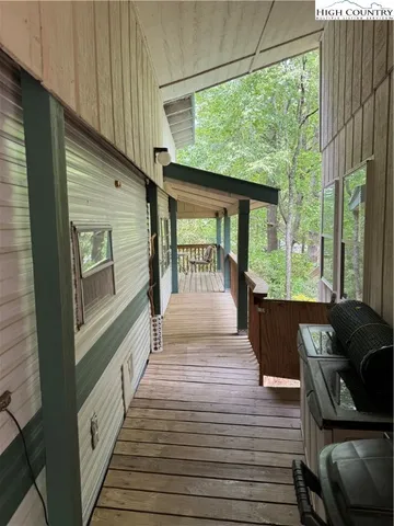 a view of a porch with furniture