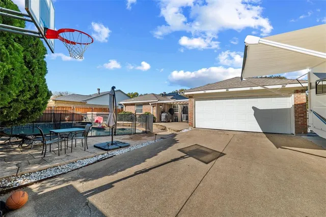 a childrens park with lots of swings and slides