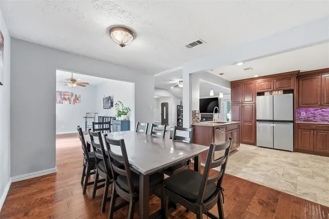 a view of a dining room with furniture