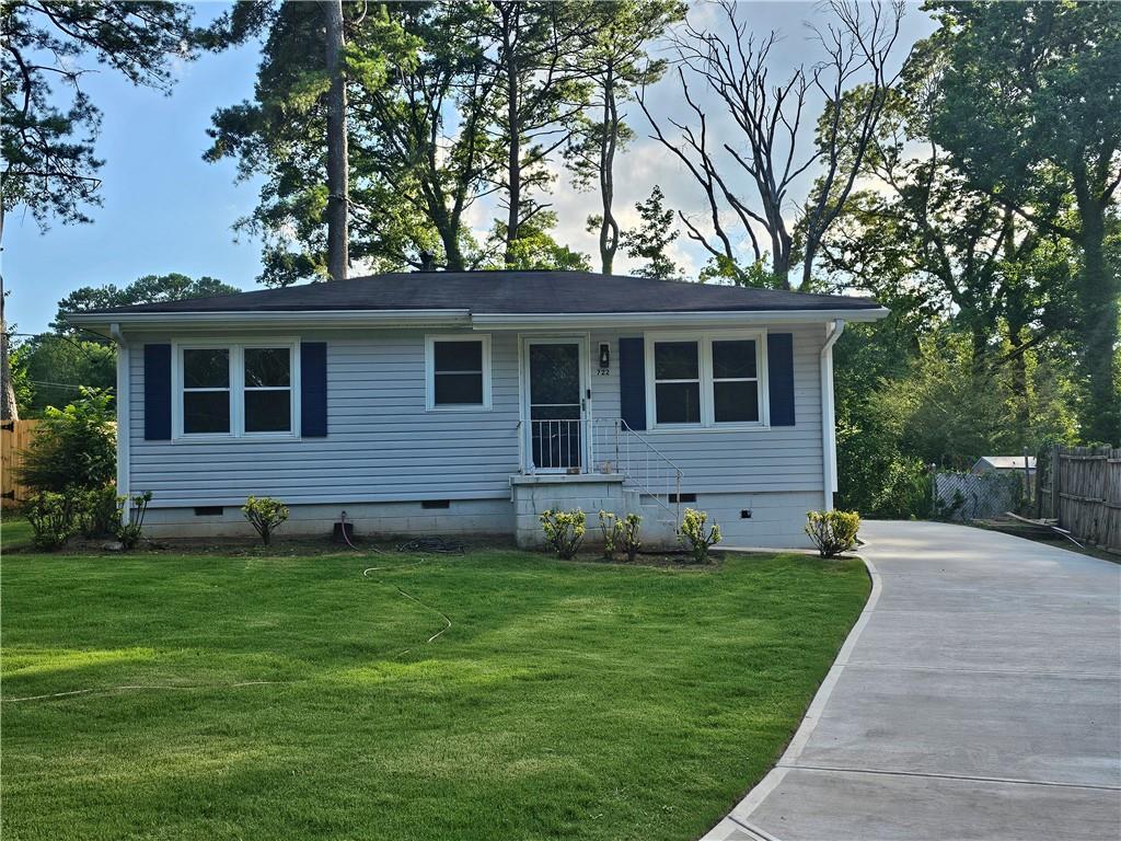 722 Ford Place Decatur, GA 30033 - Photo 1 of 1 a front view of a house with a yard