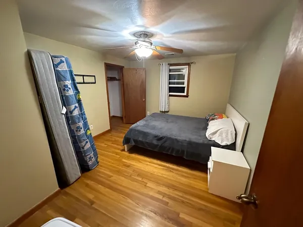 a kitchen with stainless steel appliances granite countertop a refrigerator a stove and a sink