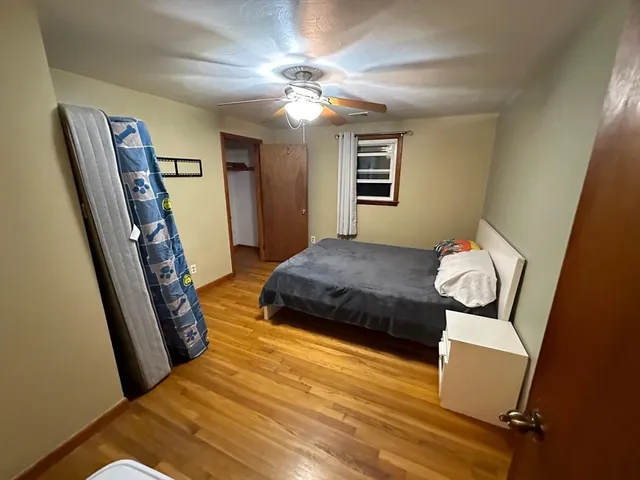 a kitchen with stainless steel appliances granite countertop a refrigerator a stove and a sink