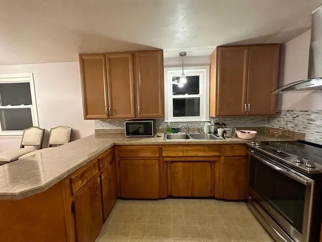 a view of a house with a big yard