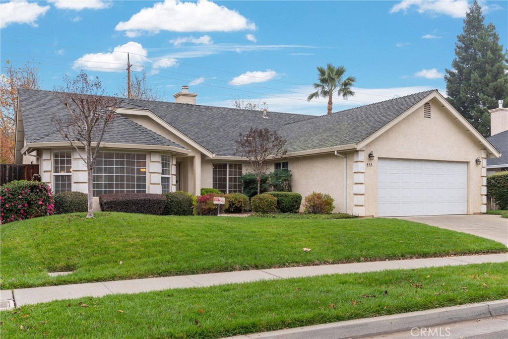 853 Coit Tower Way Chico, CA 95928 - Photo 12 of 49 a front view of a house with a garden