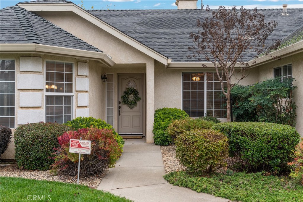 853 Coit Tower Way Chico, CA 95928 - Photo 14 of 49 a front view of a house with garden