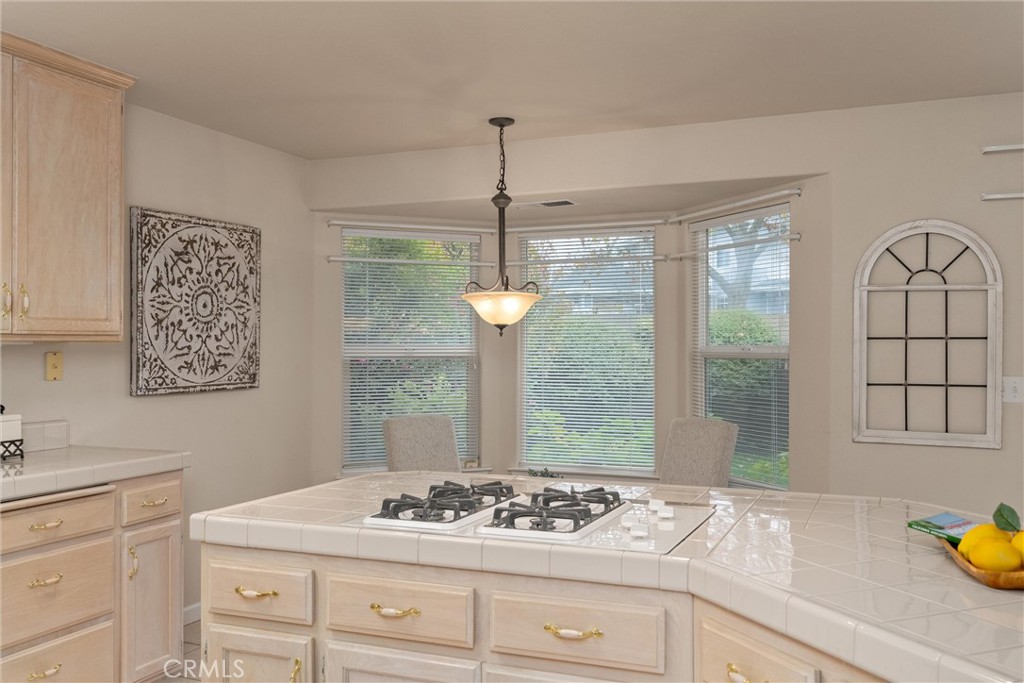853 Coit Tower Way Chico, CA 95928 - Photo 23 of 49 a kitchen with a sink stove and a window