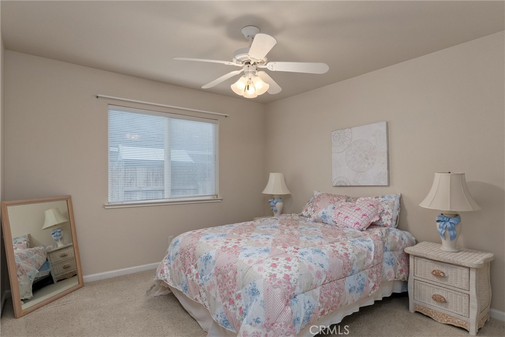 853 Coit Tower Way Chico, CA 95928 - Photo 32 of 49 a bedroom with a bed and a window